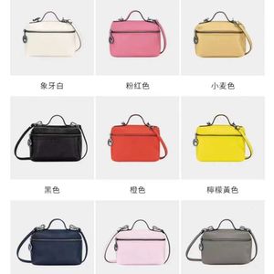 Sacs à main de luxe de haute qualité 2024 nouveau Longxiang petite boîte à lunch carrée maquillage peau de vache une épaule bandoulière portable sac pour femme