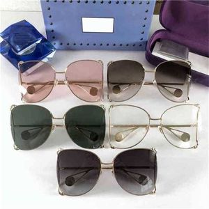 Lunettes de soleil de luxe de haute qualité 20% de réduction sur la version familiale à grande monture de lunettes de perles jambes Yang Mi Yuan Shanshan yunyun même filet rouge gg0252sKajia