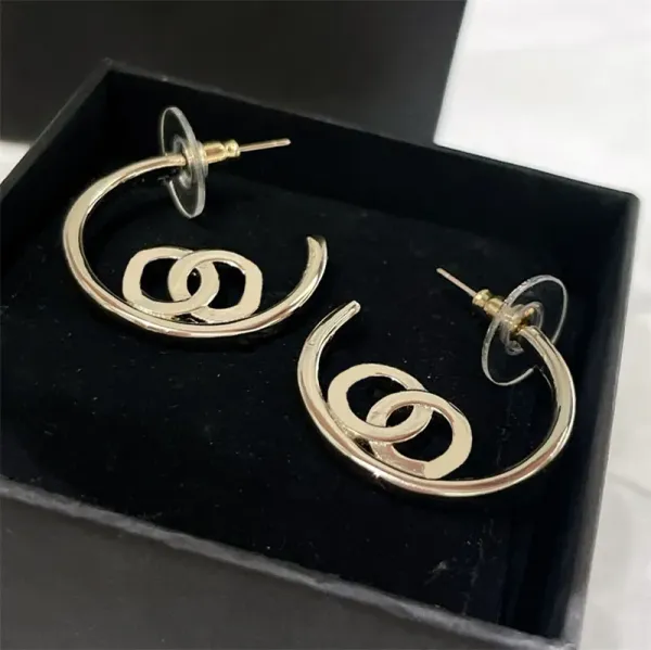 Boucles d'oreilles de cerceau de créateur de luxe pour femmes dores d'oreilles en or de bijoux Womans womans boucles d'oreille étouffe