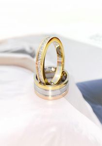 Joyería de diseño de lujo anillos para hombre tres colores con incrustaciones anillo de diamante completo acero titanio 18 quilates oro niña pareja regalo mujeres hombres anillos f2186858