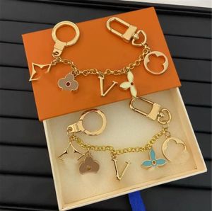 Luxe ontwerper Keychain Brand Key Chain Men Car Keyring Women Buckle Keychains Bags Hanger Prachtige geschenkdustbags