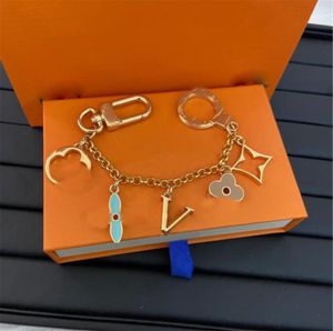 Designer de luxe porte-clés marque porte-clés hommes voiture porte-clés femmes boucle porte-clés sacs pendentif cadeau exquis avec boîte sac à poussière