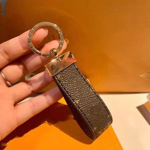 Designer de luxe porte-clés mode classique marque clé boucle lettre conception à la main or porte-clés hommes femmes sac pendentif