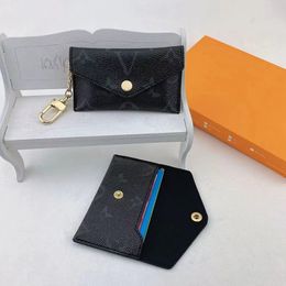 Luxe ontwerper Keychain Fashion Dames Mini Wallet Hoge kwaliteit Echte lederen mannen Munt Portemonnee Kleur Wallets Holder voor vrouwencadeau