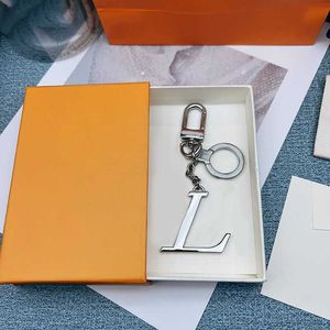 Designer esigner sleutelhanger brief hanger zilveren sleutel gespelde sleutelhangers voor heren damesmodesleutels nieuwe 1bns