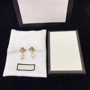 Luxury designer Little Bee Charm Earrings Retro brass White Resin Pendant earrings Women's party gift jewelry