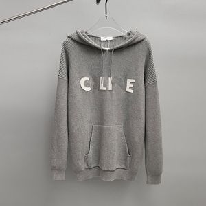 Diseñador de lujo para hombres y mujeres suéter suéter clásico parche de letra bordado con capucha chaqueta de punto de lana pareja casual top negro y gris