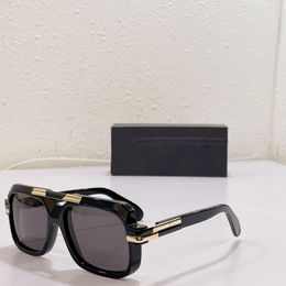 Luxe ontwerper Men Dames Zonnebril Fashion Mod663 Stijl Pop Perfect Kwaliteit Disc Black Grote Kader Schaduw Zonnebril Persoonlijkheidsbril