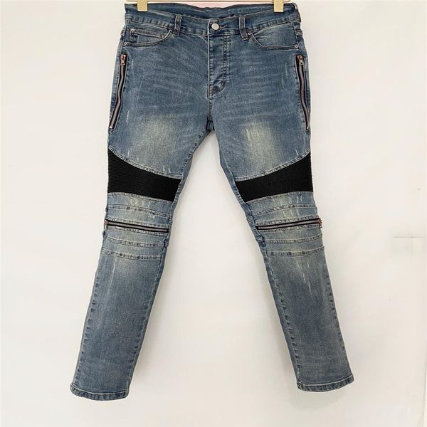 Designer de luxe Jeans pour hommes Pantalons longs Fermeture à glissière maigre Genou noir bleu Cuir Spell Détruire la courtepointe Jean de mode trou déchiré Hommes D256t