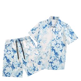 Designer de luxe pour hommes en survêtement de mode d'été sets sets masculins imprimées t-shirts à manches courtes combinaison de qualité haut de gamme 13 couleurs t-shirts et shorts 2 pièces