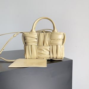 Diseñador de lujo Mini Arco Tote Bag Women Bolsas cruzadas de cuerpo Cross de piel de ternera Polso de mano de calidad de piel de cuero pulido