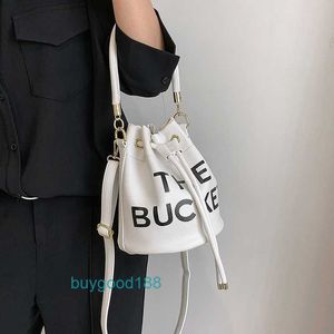 Luxe ontwerper Miozj Bucket Bag High Class Schouder Dames Koreaanse mode bedrukte messenger ins Drawstring Handtas