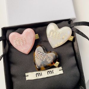 Designer de luxe MM Brand Love Heart Coil Clip Hairclip 18k Gold Belle Boucles d'oreilles en or Perle de perle