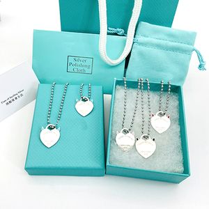 Designer de luxe Nouveau 19mm Coeur Colliers Femmes Clé Pendentif Mode Couple Perles Chaîne Bijoux En Acier Inoxydable Cadeaux Pour Petite Amie Accessoires En Gros