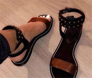 Designer de luxe Imprimer Cuir Nomad Sandal Antidérapant Gladiator Cuir Plat Plaine Pantoufles Pompes Casualsandal Sandales Femmes Été