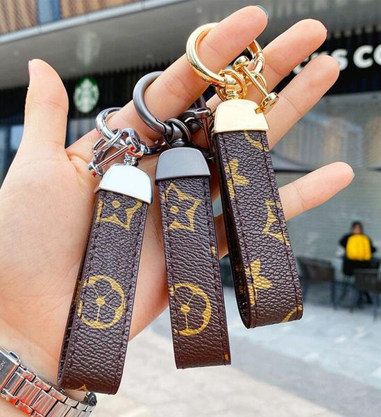 Designer de luxe PU cuir porte-clés concepteur porte-clés boucle amoureux voiture porte-clés à la main hommes femmes sac pendentif accessoires