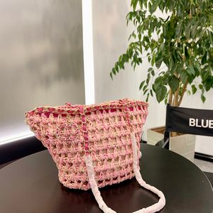 Luxe ontwerper Raffia Woven Straw Beach Shoping Bags met gelukkige charme grote capaciteit handtassen buiten Sacoche trends Pocket 27x23cm voor meisjes dames dames zomer