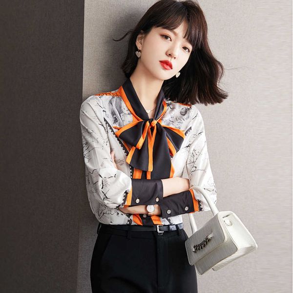 Luxury Designer Pisteway Femme Shirts Ribbon Map Fancy World Map Imprimé Bow Tie Neck Ladies Office Office Blouses Classic Bouton Long Man Man sur Gloffon Tops Hiver