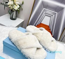 Sandales de luxe célèbres femmes hommes épais bas curseurs appartements tongs plate-forme perforée imprimé animal en caoutchouc mocassins gelée sandale toile