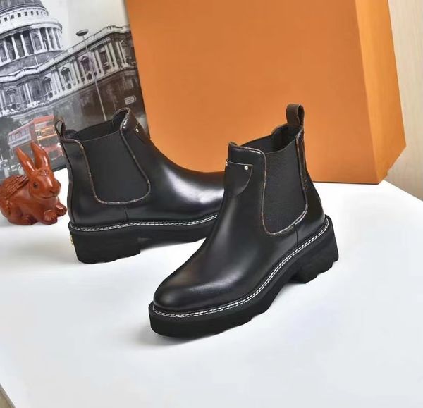 Zapatos de diseñador de lujo Botas de cuero de tobillo Botas de nylon para mujer Tacones altos Fondo grueso Negro Otoño e invierno Muffins Tubo corto Lujos