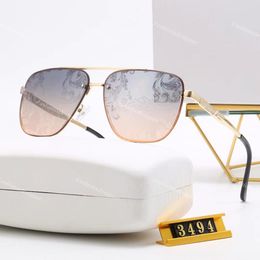 Gafas de sol de diseñador de lujo Gafas de sol de diseñador para hombre Gafas de sol de hombre clásicas con montura de metal Gafas de sol de tendencia de tiro en la calle Gafas de sol con lentes de impresión con caja 3494