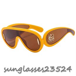 مصمم النظارات الشمسية الفاخرة أزياء العلامة التجارية النظارات الشمسية الإطار الكبير للنساء الرجال للجنسين السفر عدسة مكبرة الطيار الرياضة لون أسود دي أورانج