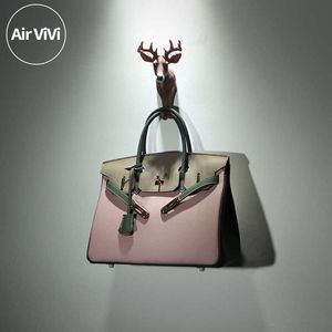 Luxe designer draagtassen B-rikis online winkel Airvivi Art Style New True Leather Bag Gekleurde dames toplaag koeienhuid handtas met echt logo