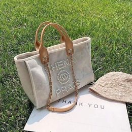 Bolso de mano de diseñador de lujo Bolso de perlas Bolso de hombro para mujer Channel Beach de gran capacidad Deauvilles Cartera grande junto al mar Bolso de compras clásico Monedero de viaje para padres e hijos