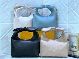 Diseñador de lujo Tote Purse Fashion Tote Bag Bolso de cuero Mujer Estilo clásico New Bowknot Bags M20701 POR QUÉ NUDO Cremallera doble Por qué Knot Bags