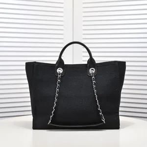 Diseñador de lujo Tote Mujeres Bolso de compras Bolso de playa de mezclilla clásico Bolsos de hombro de moda Cadena Totes casuales Mujer Bolsos de mano de gran capacidad con monedero de embrague