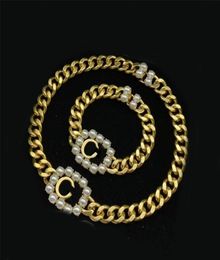 Chaînes de concepteurs de luxe Collier Perle Perl Pendant Colliers avec bracelets en or rétro et bijoux de mode chaîne 944787302