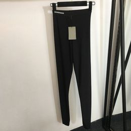 Letras de correas Mujeres Leggings Pantalones Pantalones negros Pantalones de diseño de lujo