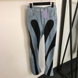 Diseñador de lujo Mujer Jeans Pantalones Contraste Color Trabajo de parches Mujer Jean Pantalones Denim Negro Denim Legging Pantalones