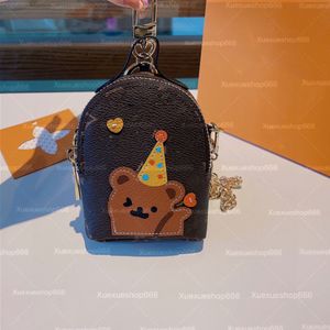 Diseñador de lujo Mujeres Carta Monederos Monederos Conejo Perro Oso Mini Mochila Clave Monedero Marca Dragón Cremallera Cadena Bolsas de hombro Bolsa de almohada Bolsos de mujer Colgantes Encantos