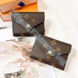 Luxe Designer Dames Heren Sleutelportemonnee M41938 victorine Pouch Portemonnees Kaarthouder Portemonnee Klassiek en retro Echt leer Kaarthouders Rits kaartsleuf Portefeuilles