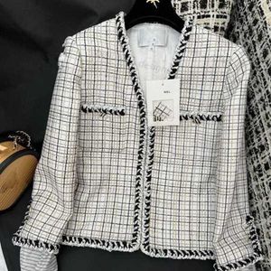 Luxe designer damesjack vroeg voorjaar nieuwe beroemdheid kleine geurige wind gesplitste gekleurde checker geweven v-neck mouwen afneembare jas voor vrouwen