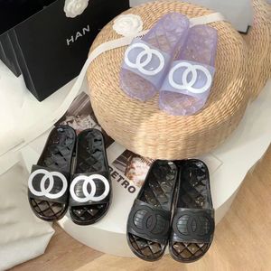 Été nouvelle sandale designer femmes homme luxe sexy diapositives brillant clair caoutchouc transparent PVC piscine pantoufles de plage chaussures de lettre plate avec boîte
