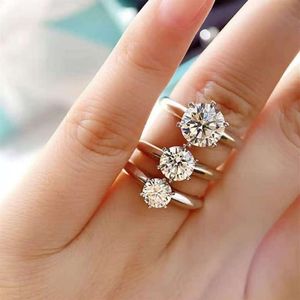 Luxuriöse Designer-Mode, Sechs-Klauen-Diamant, 1 oder 2 Karat, platiniertes Sterlingsilber, Damen-Hochzeits- oder Verlobungsring235O