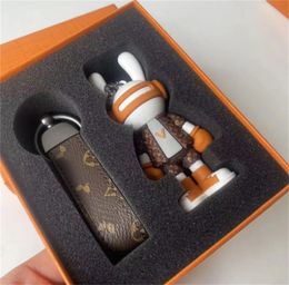 Diseñadores de lujo llavero muñeca joyas de joyas mochila mochila tendencia colgante de cuerda avanzada llaves boutique llaves regalos dados adecuados para hombres y mujeres