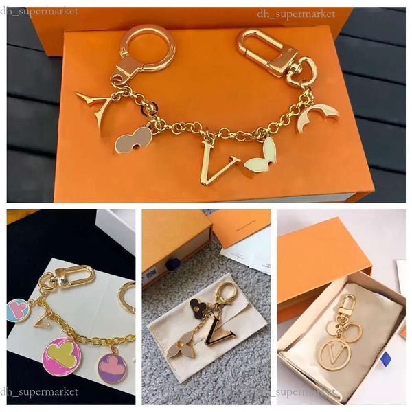 Designers de luxe Porte-clés Lettres avec diamants Louiseities Viutonities Porte-clés Top Voiture Porte-clés Femmes Boucle Bijoux Porte-clés Sacs Pendentif Cadeau Exquis