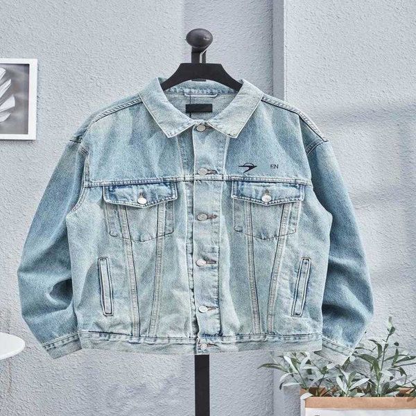 Designers de luxe Nouveaux hommes et femmes à manches à manches à manches à manches à manches à manches à manches à manches à manches à manches à manches courtes Haute édition familiale automne / hiver nouvel art Arrow Element brodé de veste brodée Couple Denim