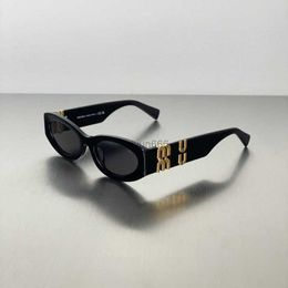 Lunettes de soleil de luxe femmes Miao famille lunettes de soleil femme haute édition français yeux de chat ovale lettre d'or miroir jambes lunettes de soleil femme Miui