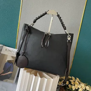 Luxe ontwerpers bakken dameshandtassen mode weven draagbare boodschappentassen uitgehold bloem lederen dame clutch portemonnee