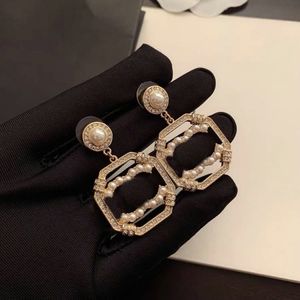 Boucles d'oreilles de diamant de luxe LETTES BIENDRES FEMMES CRISTAL RHINESTONE PERLE DÉRIEUR BRINGUELLE FEMMES BIELLES DE MEILIAGE GABEAU