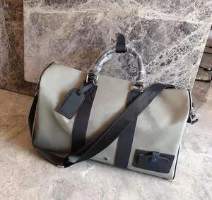 Luxe plunjezakken ontwerpers tas 55cm Reisbagage ontwerpers tassen plunjezakken pu lederen emmer vorm een schouder zilveren ketting crossbody tas