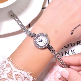Bracelet de mode de luxe montres cristal brillant femmes en acier inoxydable rétro montres à quartz plein diamant dames petite horloge pour cadeau