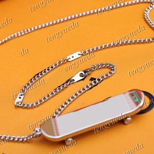 Créateur de mode de luxe Skateboard pendentif colliers chaîne réglable poulie rotative en métal lettres gravées pour hommes femmes cadeau