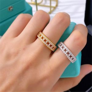 Luxe modeontwerpers T-raster diamanten ring klassieke uitgeholde ringen essentieel cadeau voor mannen vrouwen Sieraden goud en zilver 2 kleuren
