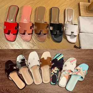 Luxury Fashion Ladies Oran Slipper Sandalias Sexy Diseñador Mujeres Sliders de cuero genuino zapatos de playa de verano