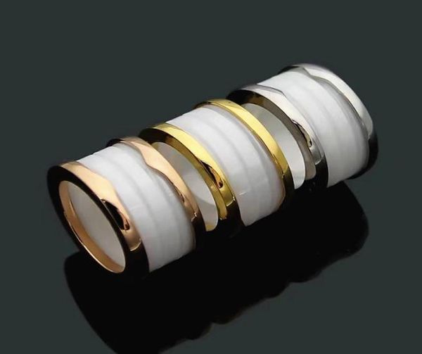 Luxury Fashion Men SilverGoldrose Gold Metal Ceramic Band Spring Band Rings Never Fade Parejas 18K Mujer anillo Amantes de regalos JE5247538